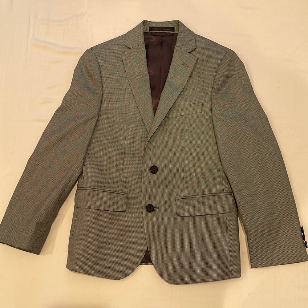 Boys sports jacket. Worn once. Brand new.